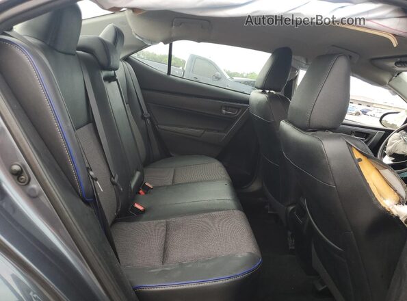 2T1BURHE7JC067610 2018 TOYOTA COROLLA Gray Vista de los asientos traseros