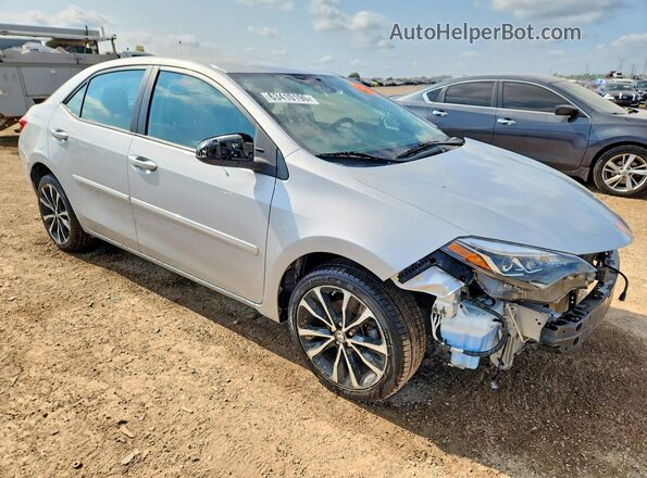 2T1BURHE7JC097433 2018 TOYOTA COROLLA Серебряный Передняя правая четверть