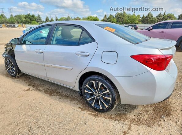 2T1BURHE7JC097433 2018 TOYOTA COROLLA Серебряный Задняя левая четверть