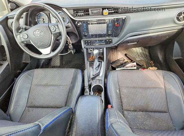 2T1BURHE7JC097433 2018 TOYOTA COROLLA Серебряный Вид панели приборов