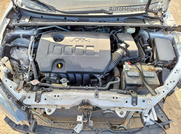 2T1BURHE7JC097433 2018 TOYOTA COROLLA Серебряный Вид задней части салона