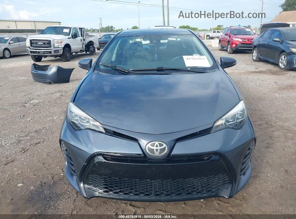 2T1BURHE7JC119978 2018 TOYOTA COROLLA Gray Rear interior view