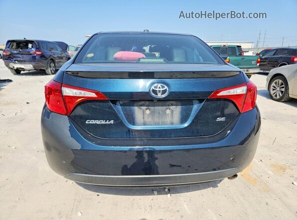 2T1BURHE7KC189126 2019 TOYOTA COROLLA Blue Vista trasera