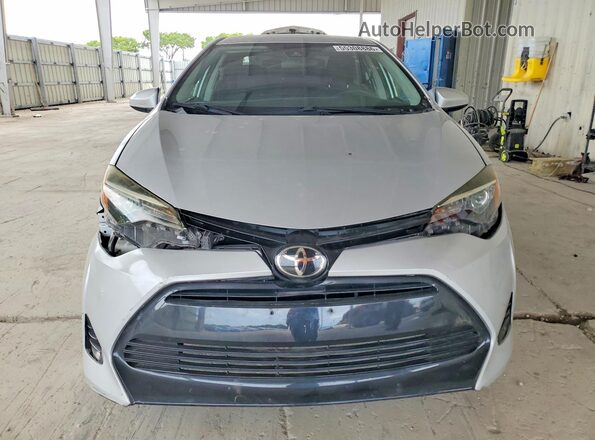 2T1BURHE7KC196870 2019 TOYOTA COROLLA Silver წინა ხედი