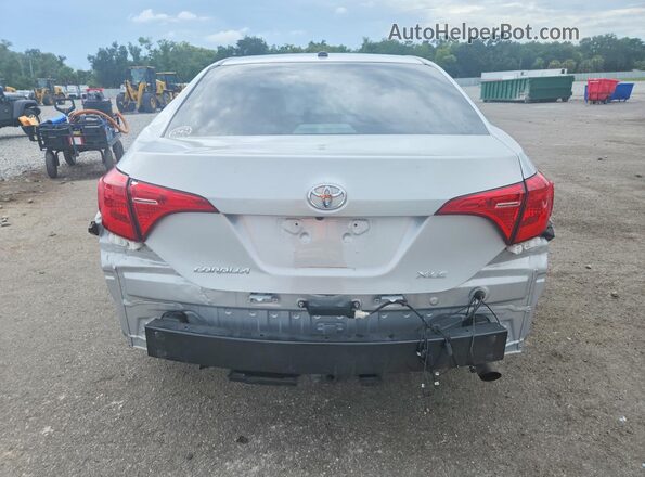 2T1BURHE7KC206233 2019 TOYOTA COROLLA Silver Widok z tyłu