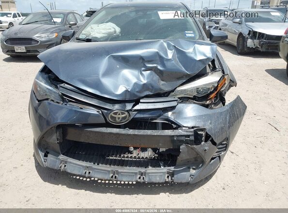 2T1BURHE7KC207141 2019 TOYOTA COROLLA Blue Widok z przodu