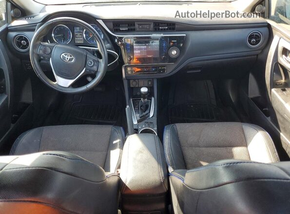 2T1BURHE8HC761832 2017 TOYOTA COROLLA Синий Вид панели приборов