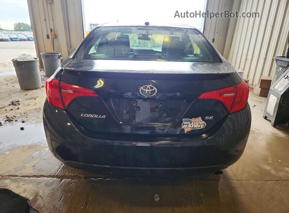 2T1BURHE8HC808261 2017 TOYOTA COROLLA Черный Вид сзади