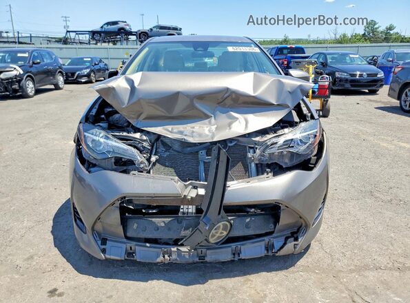 2T1BURHE8HC852440 2017 TOYOTA COROLLA Tan Vista frontal