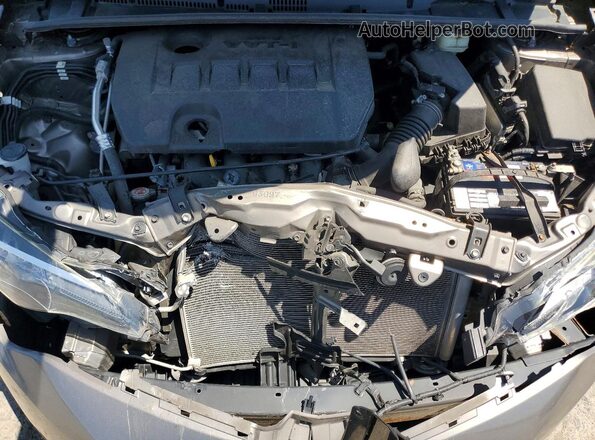 2T1BURHE8HC852440 2017 TOYOTA COROLLA Tan Vista interior trasera