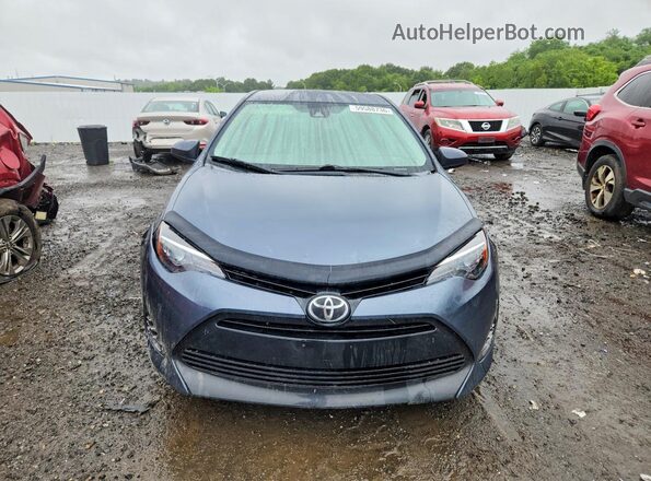 2T1BURHE8HC874597 2017 TOYOTA COROLLA Blue Вид спереду