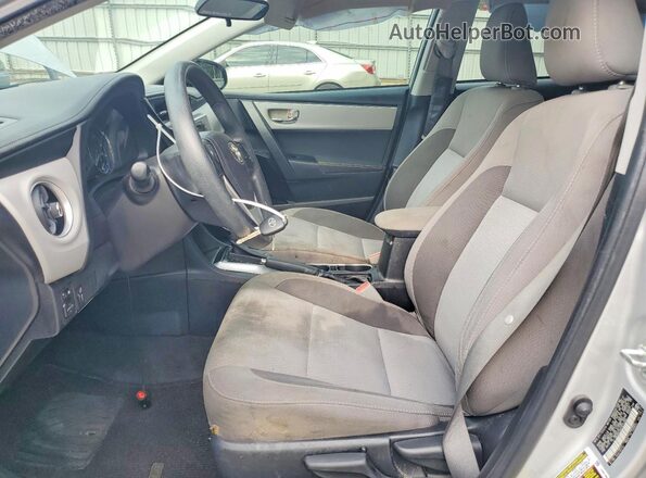 2T1BURHE8HC875264 2017 TOYOTA COROLLA Silver წინა სალონის ხედი