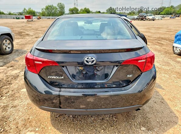 2T1BURHE8HC882506 2017 TOYOTA COROLLA Black Հետևի տեսք
