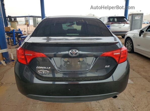 2T1BURHE8JC965066 2018 TOYOTA COROLLA Black Rear view