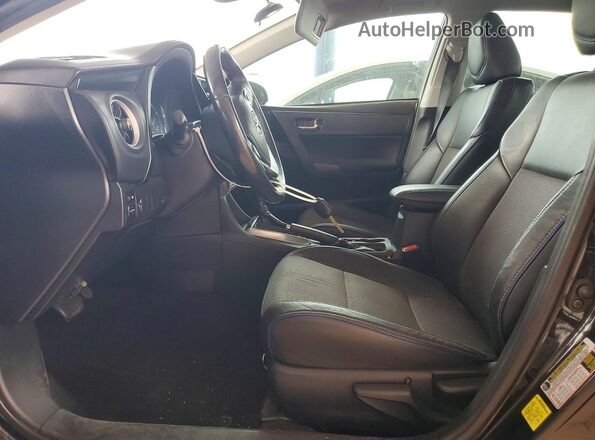 2T1BURHE8JC965066 2018 TOYOTA COROLLA Black Front interior view