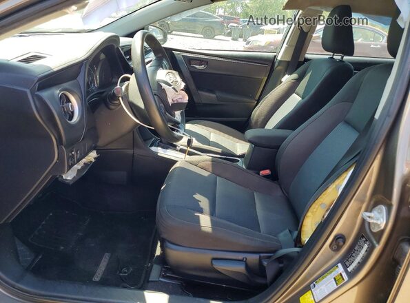 2T1BURHE8KC239290 2019 TOYOTA COROLLA Tan Вид салону спереду
