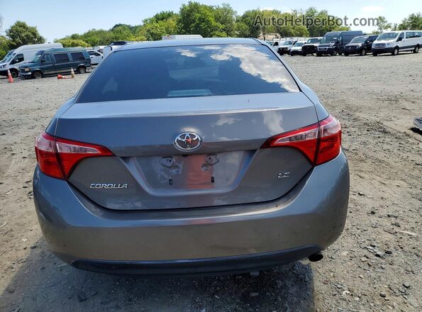 2T1BURHE8KC239290 2019 TOYOTA COROLLA Tan Вид ззаду