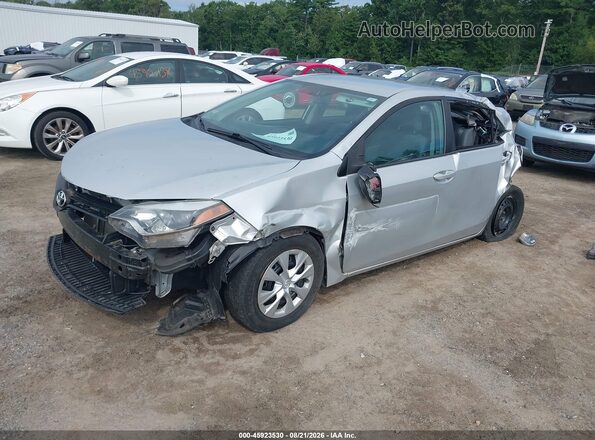 2T1BURHE9GC591737 2016 TOYOTA COROLLA Silver Vista tres cuartos delantera izquierda