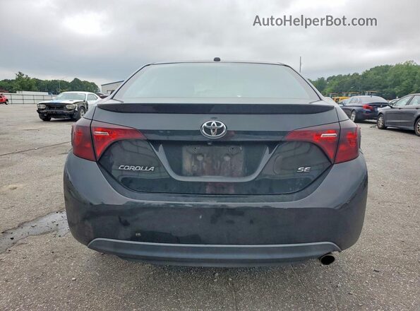 2T1BURHE9HC808060 2017 TOYOTA COROLLA Black Rear view