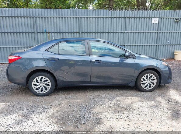 2T1BURHE9HC814747 2017 TOYOTA COROLLA Gray Vista interior trasera