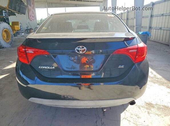 2T1BURHE9HC839101 2017 TOYOTA COROLLA Black Rear view