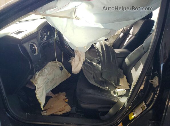 2T1BURHE9HC839101 2017 TOYOTA COROLLA Black Front interior view