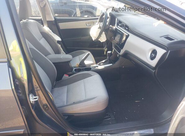 2T1BURHE9HC877475 2017 TOYOTA COROLLA Серый Вид салона спереди