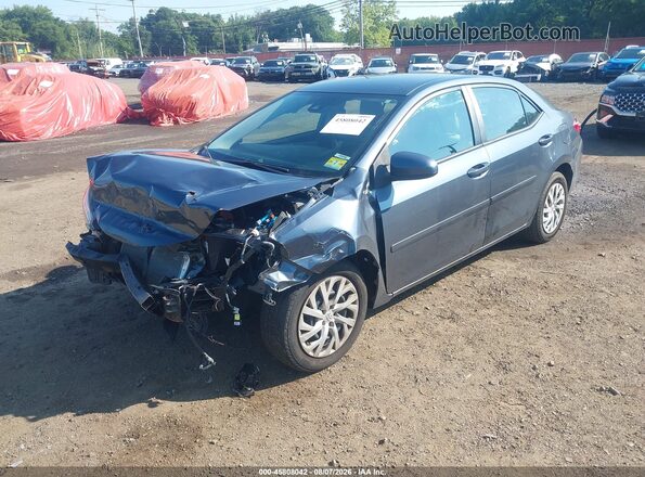 2T1BURHE9HC877475 2017 TOYOTA COROLLA Серый Вид спереди
