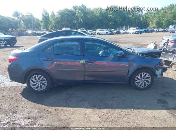 2T1BURHE9HC877475 2017 TOYOTA COROLLA Серый Вид задней части салона