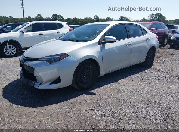 2T1BURHE9JC001527 2018 TOYOTA COROLLA Silver Առջևի ձախ երեք քառորդ տեսարան