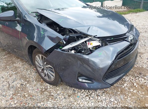 2T1BURHE9JC001723 2018 TOYOTA COROLLA Blue Widok z przodu
