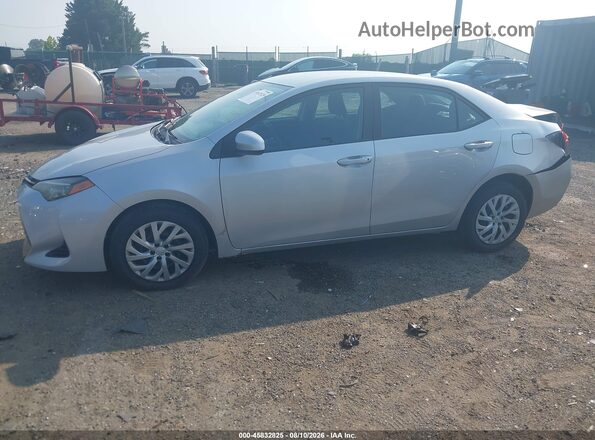 2T1BURHE9JC040280 2018 TOYOTA COROLLA Gray Vista tres cuartos delantera izquierda