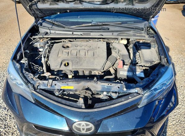 2T1BURHE9JC967859 2018 TOYOTA COROLLA Синий Вид задней части салона