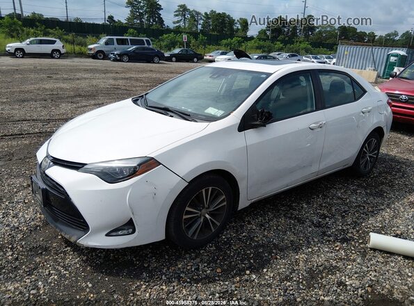 2T1BURHE9JC985228 2018 TOYOTA COROLLA White წინა მარცხენა ხედი სამი მეოთხედიდან