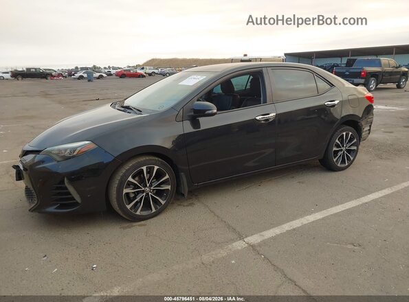 2T1BURHE9JC986699 2018 TOYOTA COROLLA Черный Передняя левая четверть