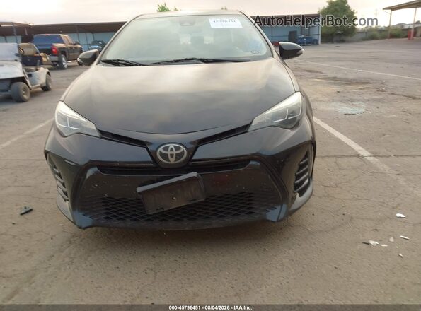2T1BURHE9JC986699 2018 TOYOTA COROLLA Черный Вид задней части салона