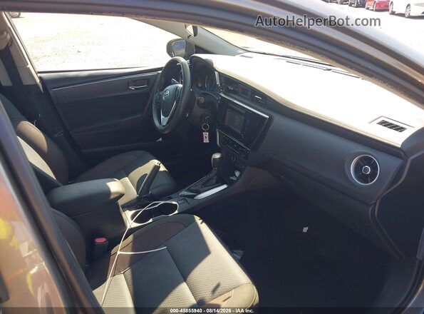 2T1BURHE9JC989439 2018 TOYOTA COROLLA Серый Вид салона спереди