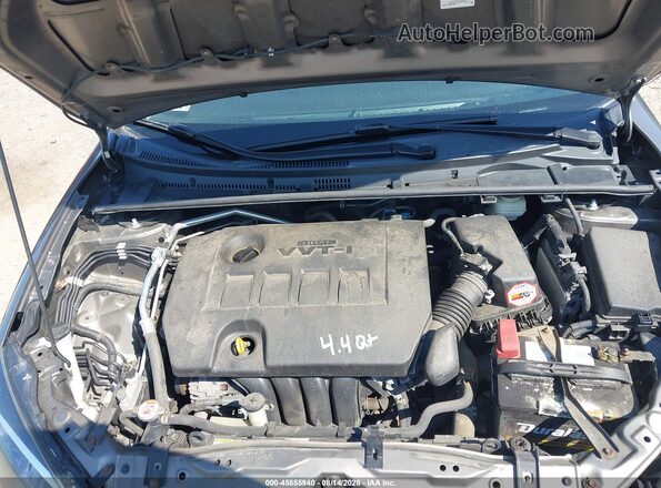 2T1BURHE9JC989439 2018 TOYOTA COROLLA Серый Вид сзади