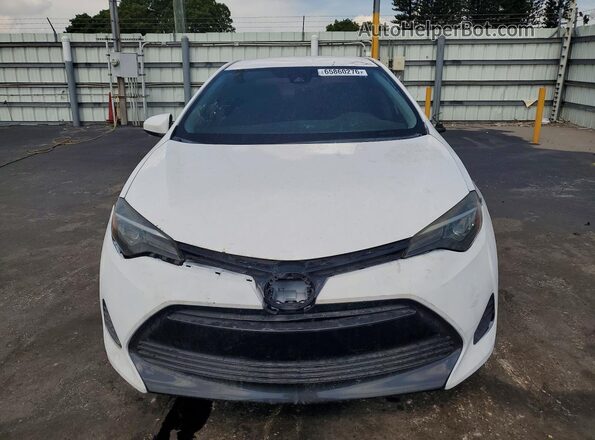 2T1BURHE9KC189483 2019 TOYOTA COROLLA White Front view