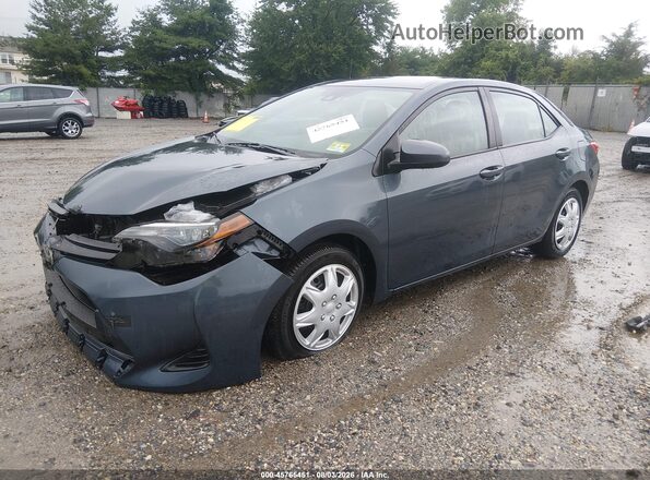2T1BURHE9KC230033 2019 TOYOTA COROLLA Light Blue Առջևի ձախ երեք քառորդ տեսարան