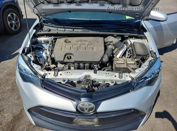 2T1BURHEXKC156427 2019 TOYOTA COROLLA Silver Սալոնի հետևի տեսք