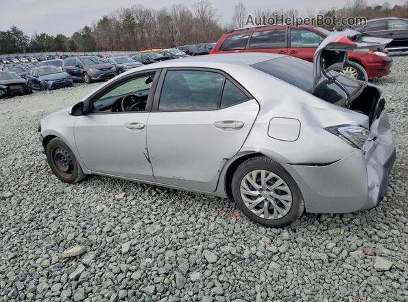 2T1BURHEXKC184437 2019 TOYOTA COROLLA Silver Trasero izquierdo