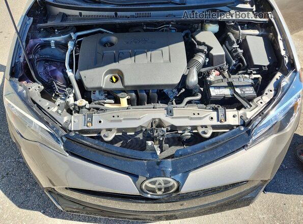 2T1BURHEXKC184583 2019 TOYOTA COROLLA Gray Rear interior view