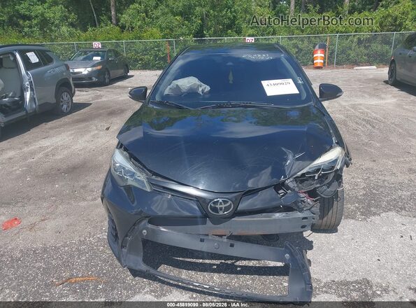 2T1BURHEXKC207988 2019 TOYOTA COROLLA Black Front view
