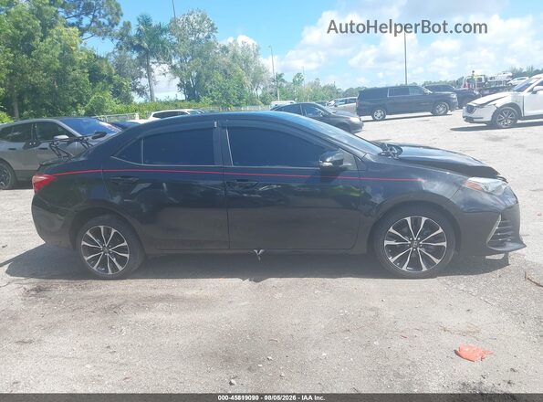 2T1BURHEXKC207988 2019 TOYOTA COROLLA Black Rear interior view