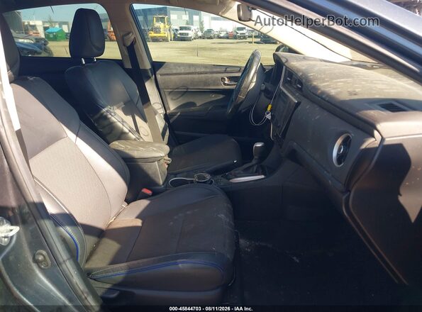 2T1BURHEXKC219767 2019 TOYOTA COROLLA Серый Вид салона спереди