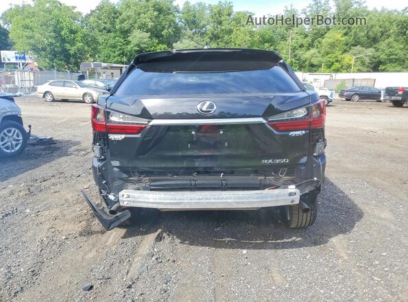 2T2AZMDAXMC307140 2021 LEXUS RX Black Вид ззаду