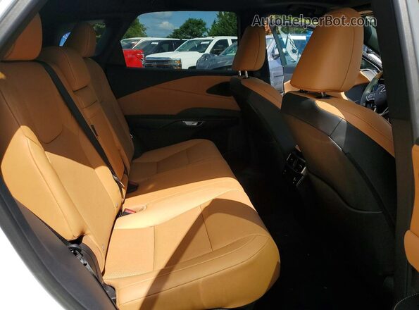 2T2BAMCA4SC123676 2025 LEXUS RX White Vista interior trasera