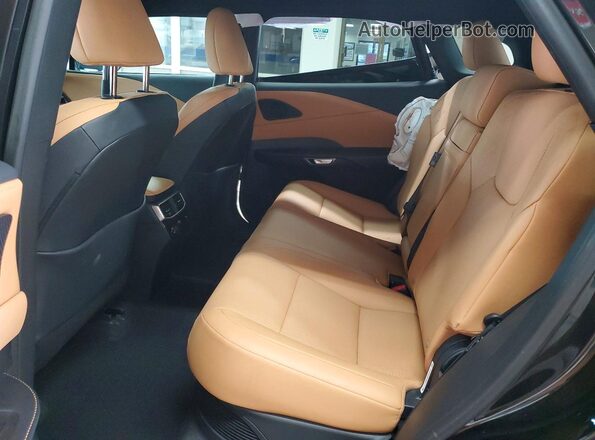 2T2BBMCA4RC058108 2024 LEXUS RX Black Vista interior trasera