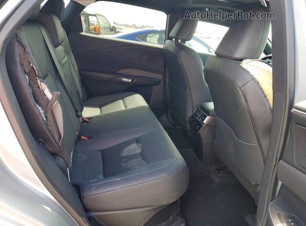 2T2BBMCA6TC140381 2026 LEXUS RX Silver Vista de los asientos traseros